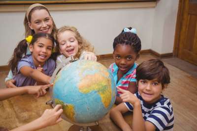 children with a globe