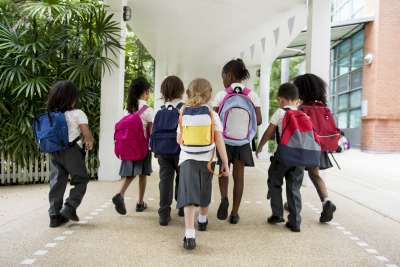 primary school schildren going to class