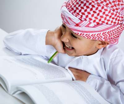 Arab Boy Reading