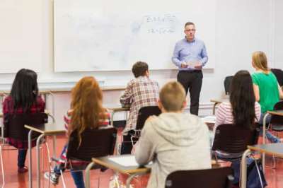teacher by the whiteboard