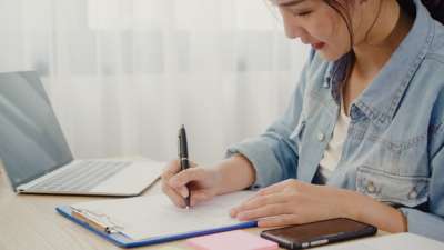 self-study woman at the desk