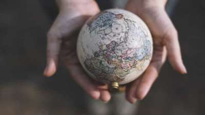 globe in hands