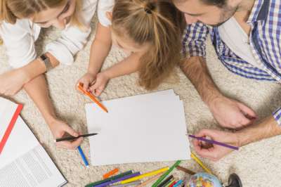 family drawing a picture