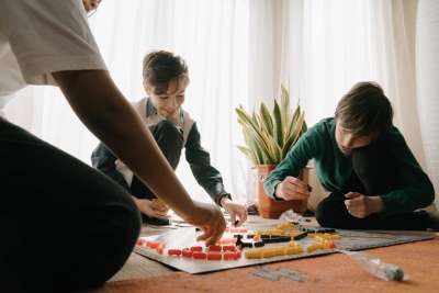 boys playing a board game