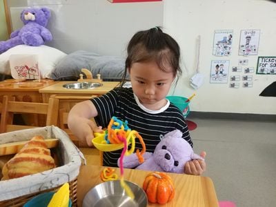 child playing with toys