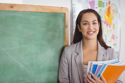 teacher by the blackboard