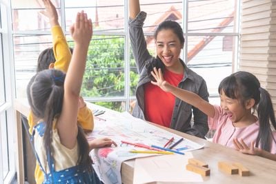 students and a teacher having an activity