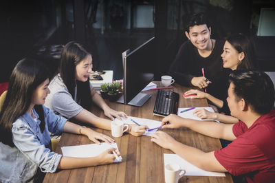 a group of students at the table