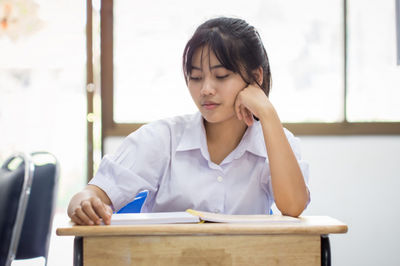 student at the desk