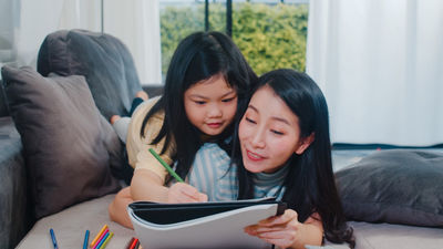 asian woman and her daughter