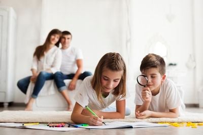 children in front with the book