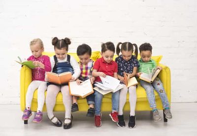 young students reading books