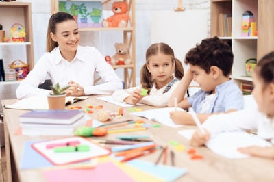 teacher and school students