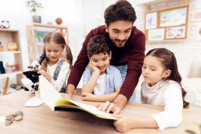 male teacher and kids