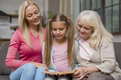 girl with her mom and grandma