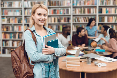 student in front of the multicultural group