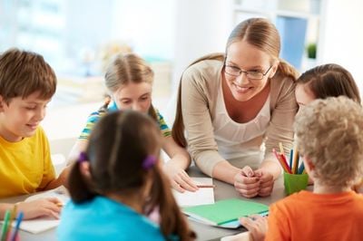 teacher and school children