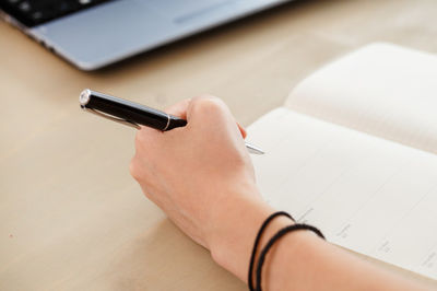 woman's hand writing