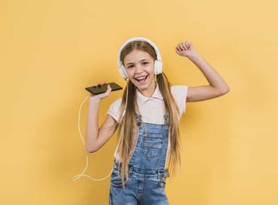 girl wearing headphones and singing