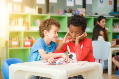 two boys reading