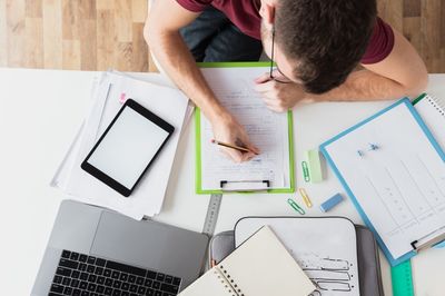 man working on the notes