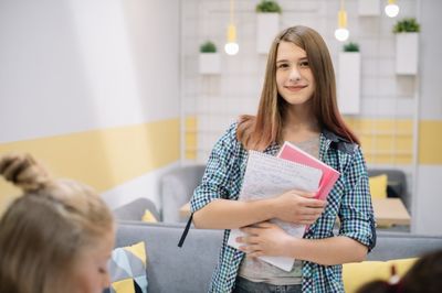 student with books