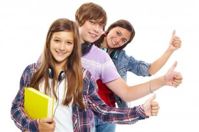 three students with thumbs up